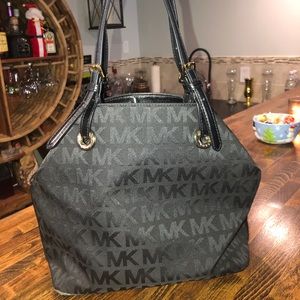 Michale Kors Black MK Fold-In Shoulder Bag